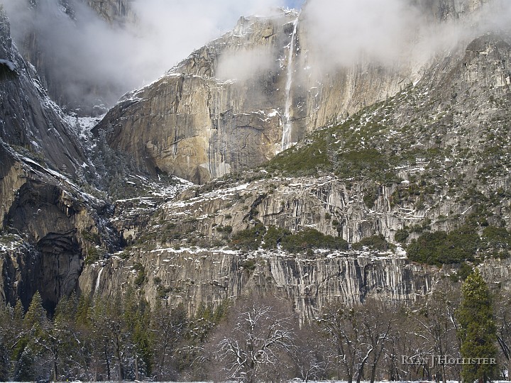 _C235958.JPG - Yosemite Falls was just barely flowing, but it did have enough water to make snow as it fell through the chilly air.