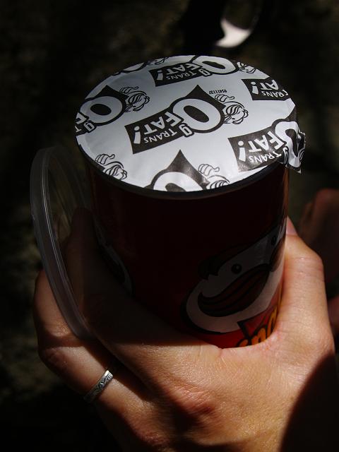 _6012380.JPG - Sustenance & science!  Look at how the relatively high gas pressure within the sealed pringles can poofs out in the thinning atmospheric pressure at 5000ft.
