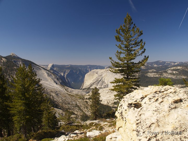 _9235198.JPG - Those potholes were found at the very top of a mountain.  Not a likely place one would assume to find a river.  I'll have to ask my geo-friends what gives. (CLICK ON THE "SEE MAP" link to see where this was)  Tenaya canyon is in the background.