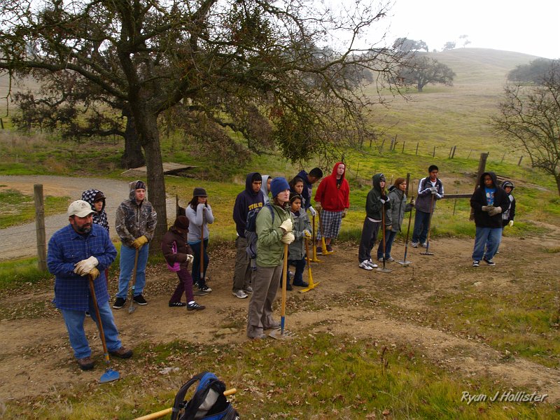 pacheco_120509_1020.JPG - A quick introduction on how to maintain the trail.  It was a bit foggy and nippy!